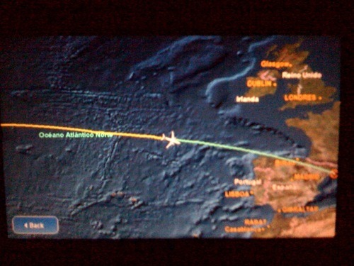 Over the big blue — our plane had nice headrest monitors (powered by Linux) that showed where we were.
