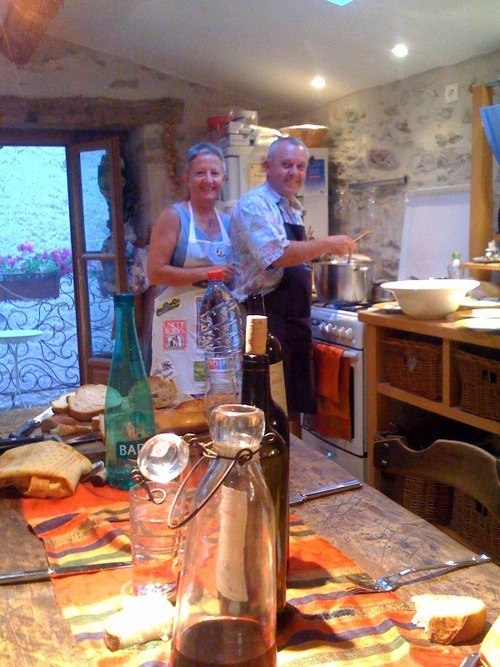 Steve and Marilyn in the kitchen cooking rabbit. The decanter is holding a 2000 vintage. Best wine I've ever had. He opened it at 9am that morning, then decanted at 5 and served around 8.